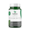 White Maeng da Kratom capsules in a 50 count capsules in a green and transparent jar with a safety cap.